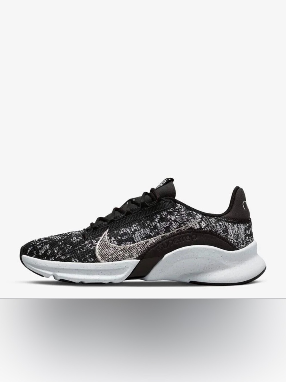 Nike Women's Black and White Knit Trainer with Speckled Midsole